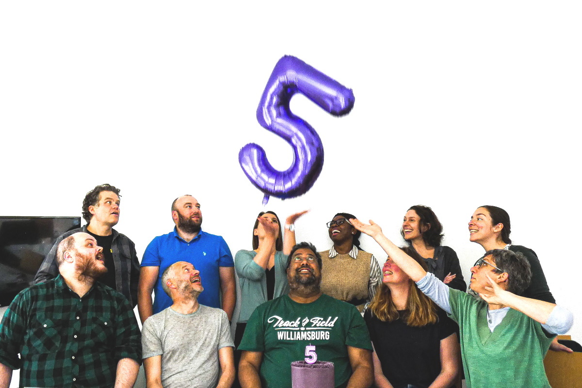 11 of the Matter of Focus team with purple number 5 balloon