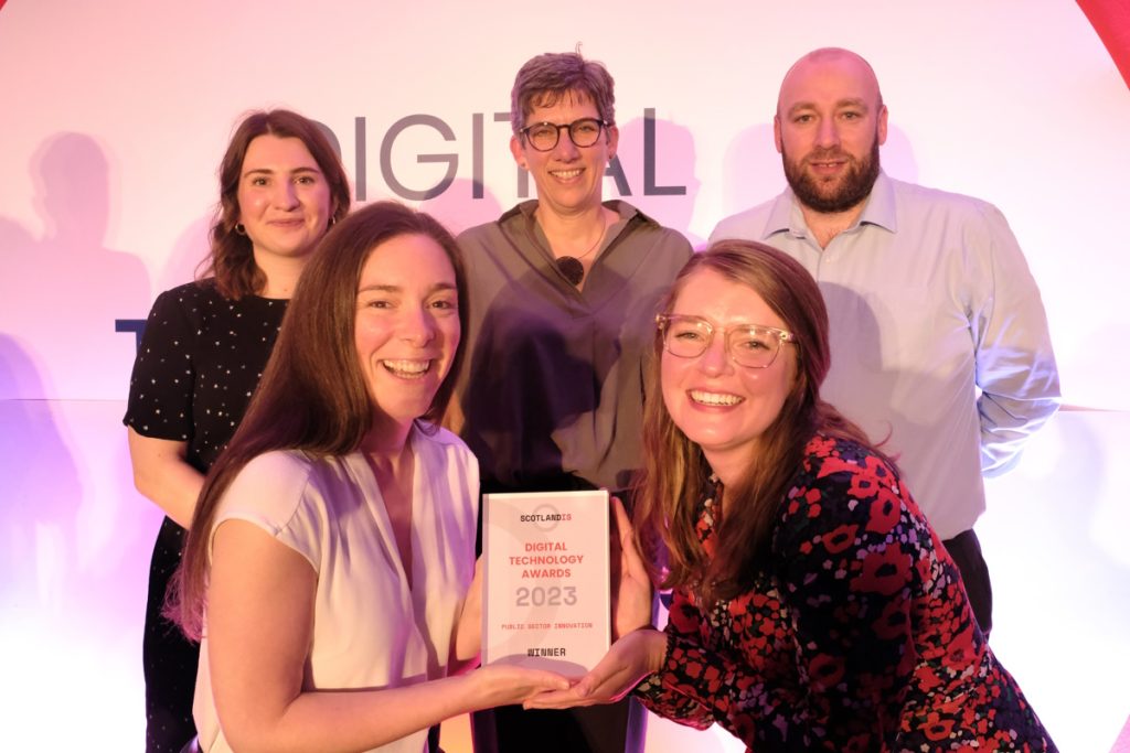 Members of the Matter of Focus show off the award! Back left to right Evaluation Consultant Miriam Scott-Pearce, Director Sarah Morton, Head of Finance & Business Allan Middlemass, Front left to right Senior Evaluation Consultant Grace Robertson, Evaluation Consultant Audrey Buelo. Photo by Communications Assistant Alex Perry